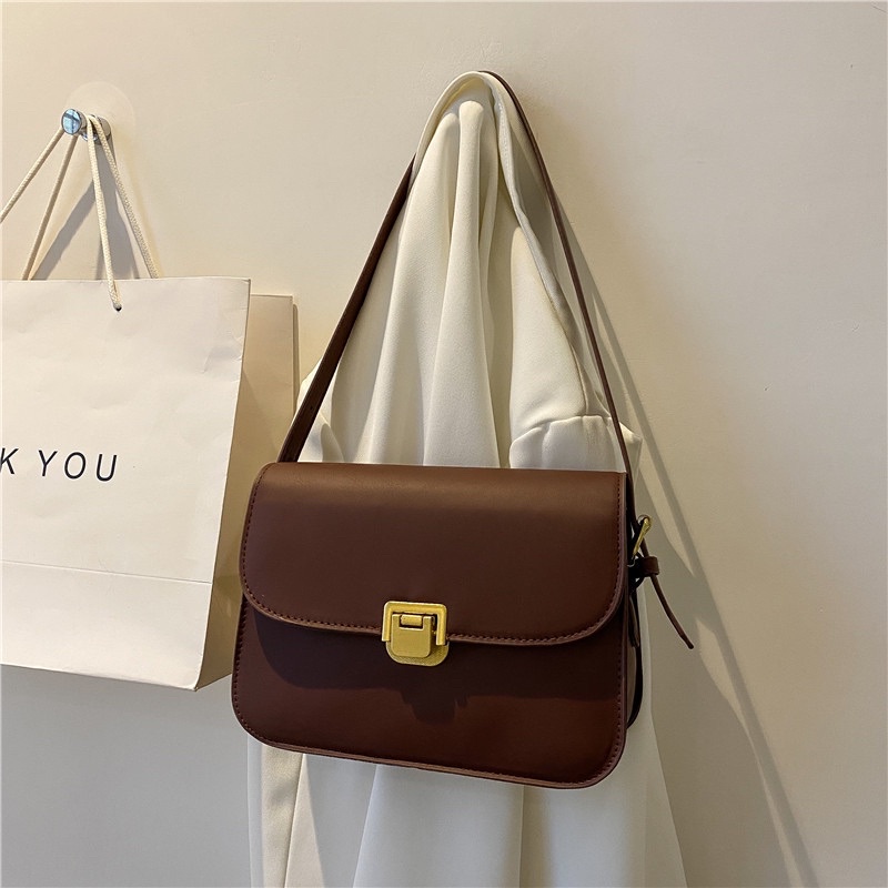 Túi xách nữ khoá gập QC đeo chéo đeo vai chất liệu da PU