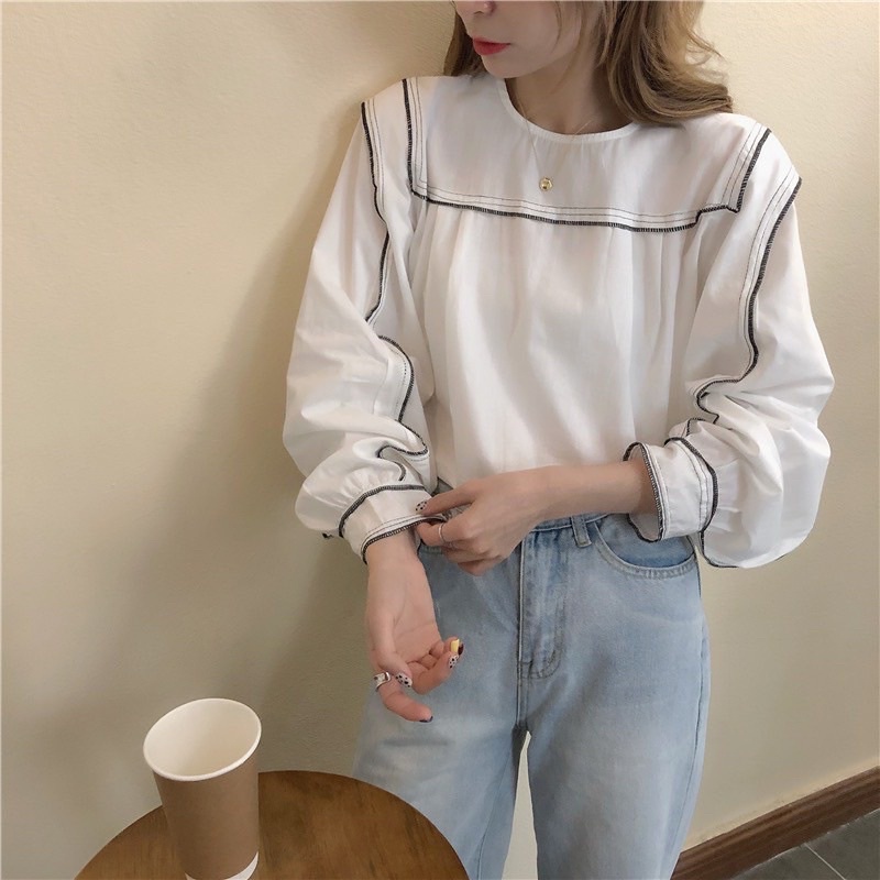 Áo trắng kiểu tay dài chạy viền chỉ đen