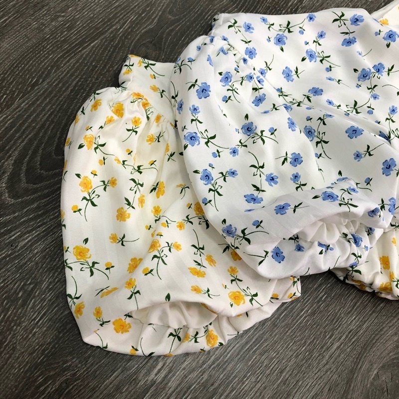 Đầm lệch vai hoa khoét eo