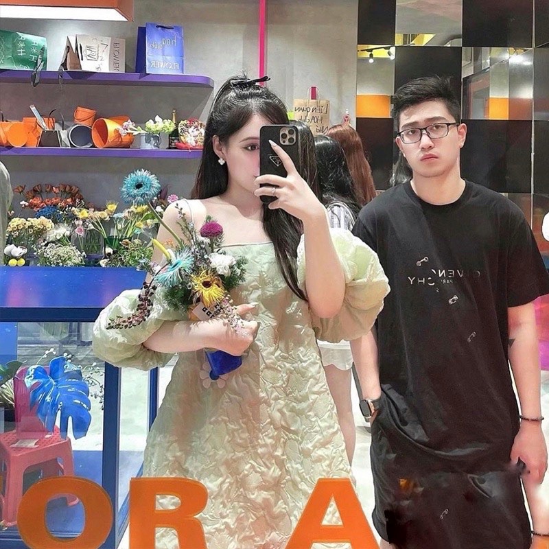 Váy hai dây tay bồng xòe đính nơ kim loại- Kem.Studio