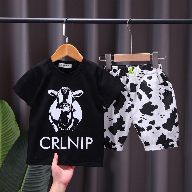 Set bộ quần áo trẻ em mùa hè dành cho bé trai 18-45kg in hình bò sữa. Chất liệu thoáng mát, co dãn tốt. HA9