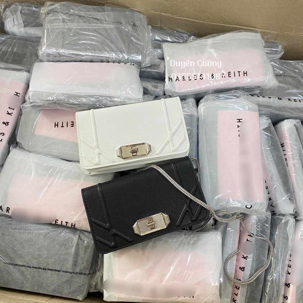 Túi đeo chéo - Túi C.K da gạo dáng dẹt size 18cm 2màu đen-trắng