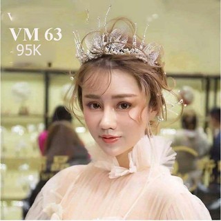 Vương miện đội đầu, vương miện đá đen, vương miện con công