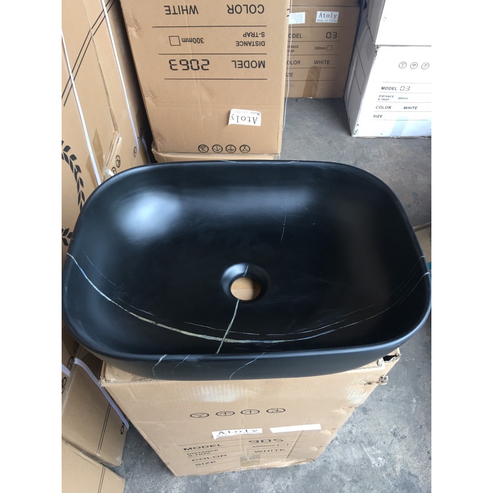 Lavabo rửa mặt đặt bàn đá màu đen vân trắng