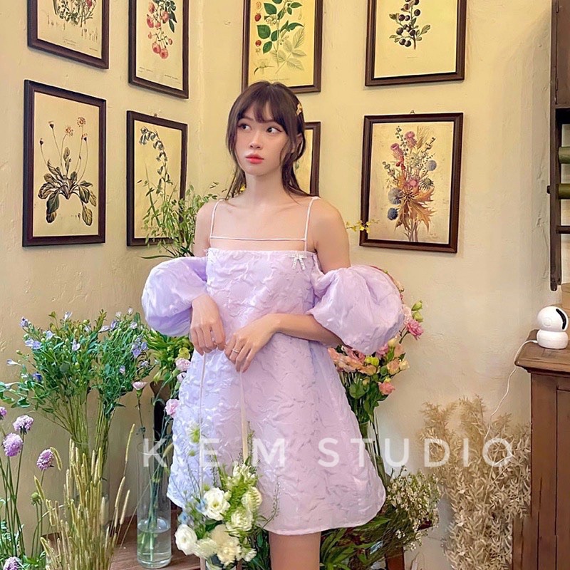Váy hai dây tay bồng xòe đính nơ kim loại- Kem.Studio