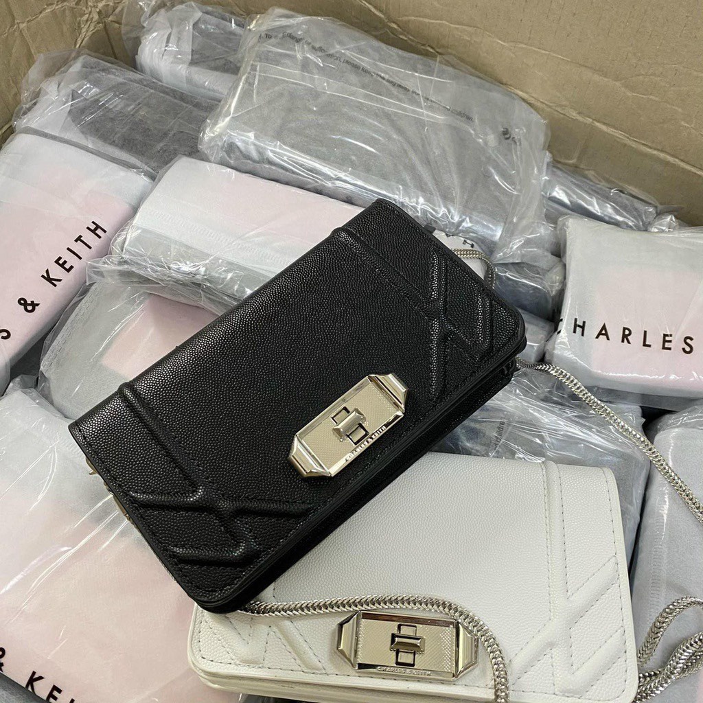 Túi đeo chéo - Túi C.K da gạo dáng dẹt size 18cm 2màu đen-trắng