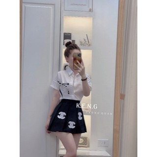 Sét sơ mi cn mix chân váy a xếp ly đính logo cực sịn