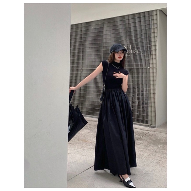 Đầm đen tay hến