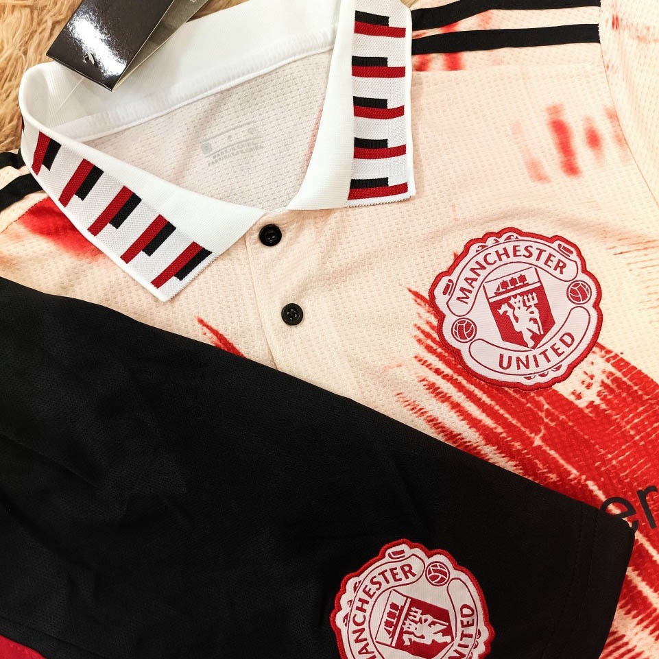 Bộ quần áo polo đá banh clb bóng đá mu thịt vàng vệt đỏ đen có cổ logo thêu vải gai thái - my thể thao