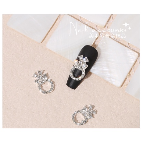 mã charm nơ tròn đính đá nhé a