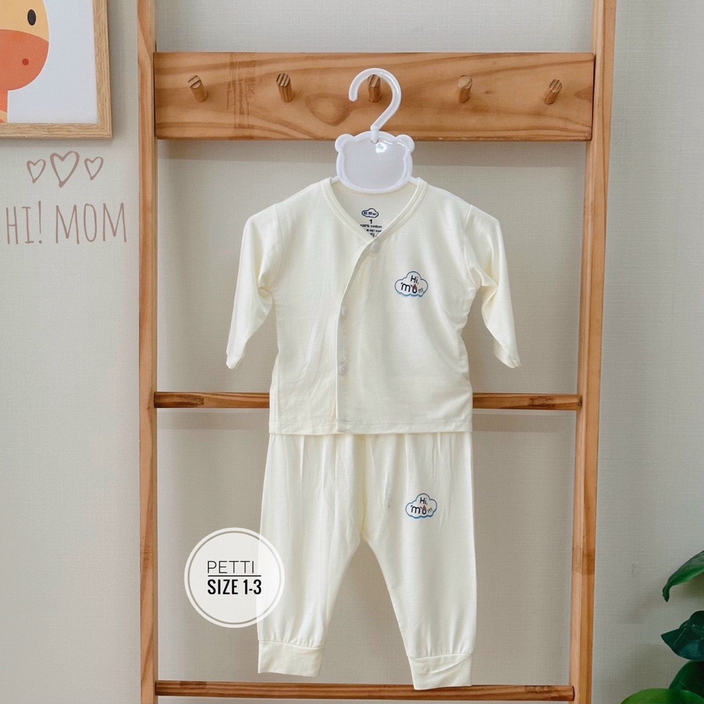 Bộ sơ sinh  dài tay Pettit nền trắng cúc cài lệch phong cách Hàn 2023