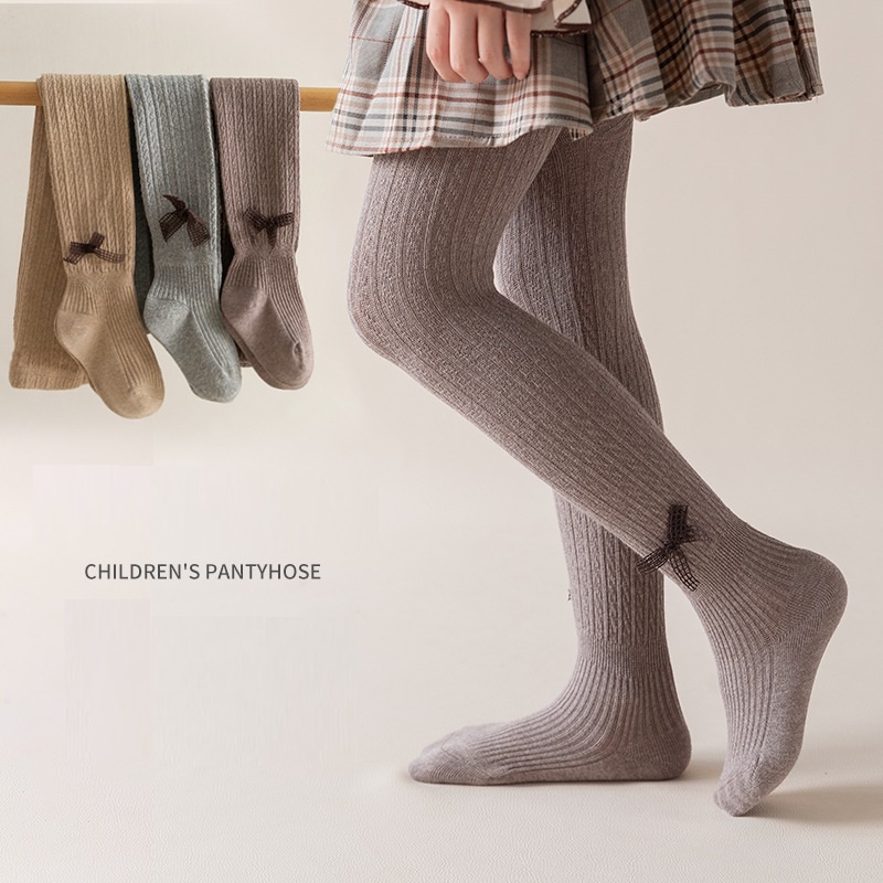 Quần tất len đính nơ cho bé gái mềm và ấm, trơn màu, co giãn 4 chiều size từ 1 đến 12 tuổi