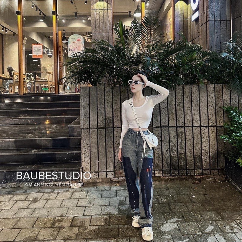 Quần jeans xuông vẩy sơn viền gấu đậm