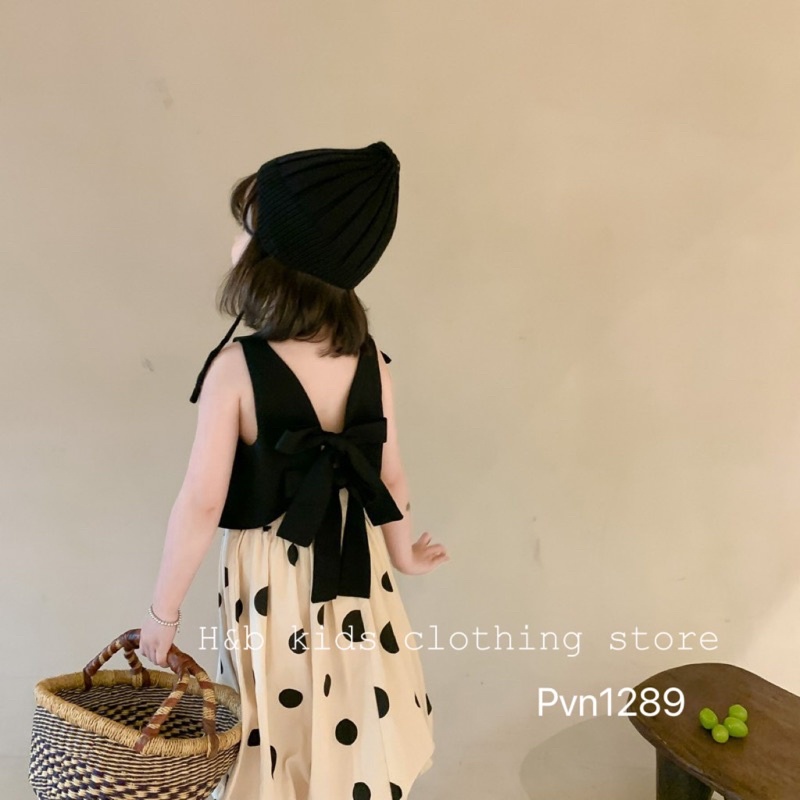 Set áo đen nơ lưng quần chấm bi cho bé gái