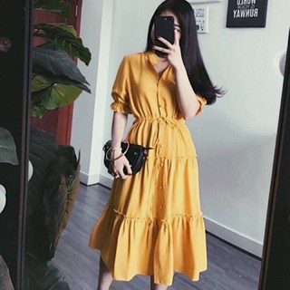 Đầm vàng nghệ tầng nút bọc