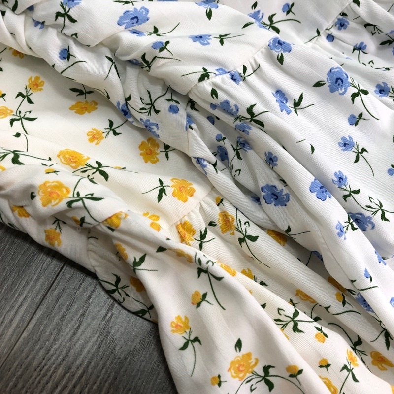 Đầm lệch vai hoa khoét eo