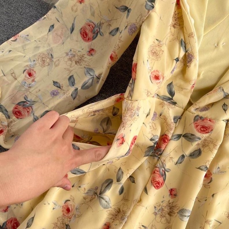 Jumsuit hoa nhí tay dài