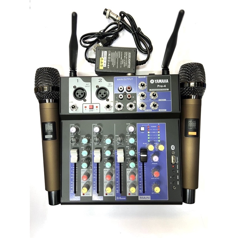 bàn trộn âm thanh mixer pro4 kèm 2 mic không dây hỗ bluetooth usb