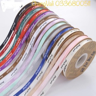 Cuộn duy băng lụa in chữ rộng 1cm dài 50m sang choảnh (chữ ngẫu nhiên)