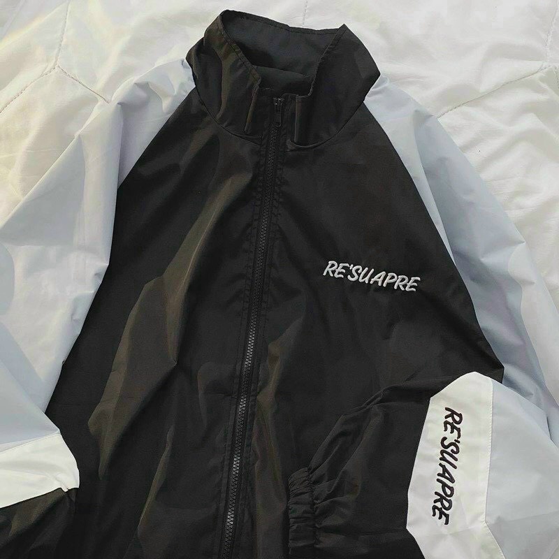 Áo khoác dù nam nữ logo RÉUAPRE được may từ chất dù hai lớp dày và mềm mịn có hai size L từkg,XL từkg