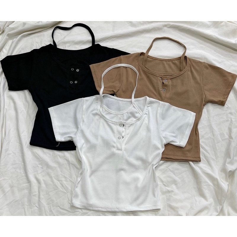 Áo gân phối yếm nút bấm