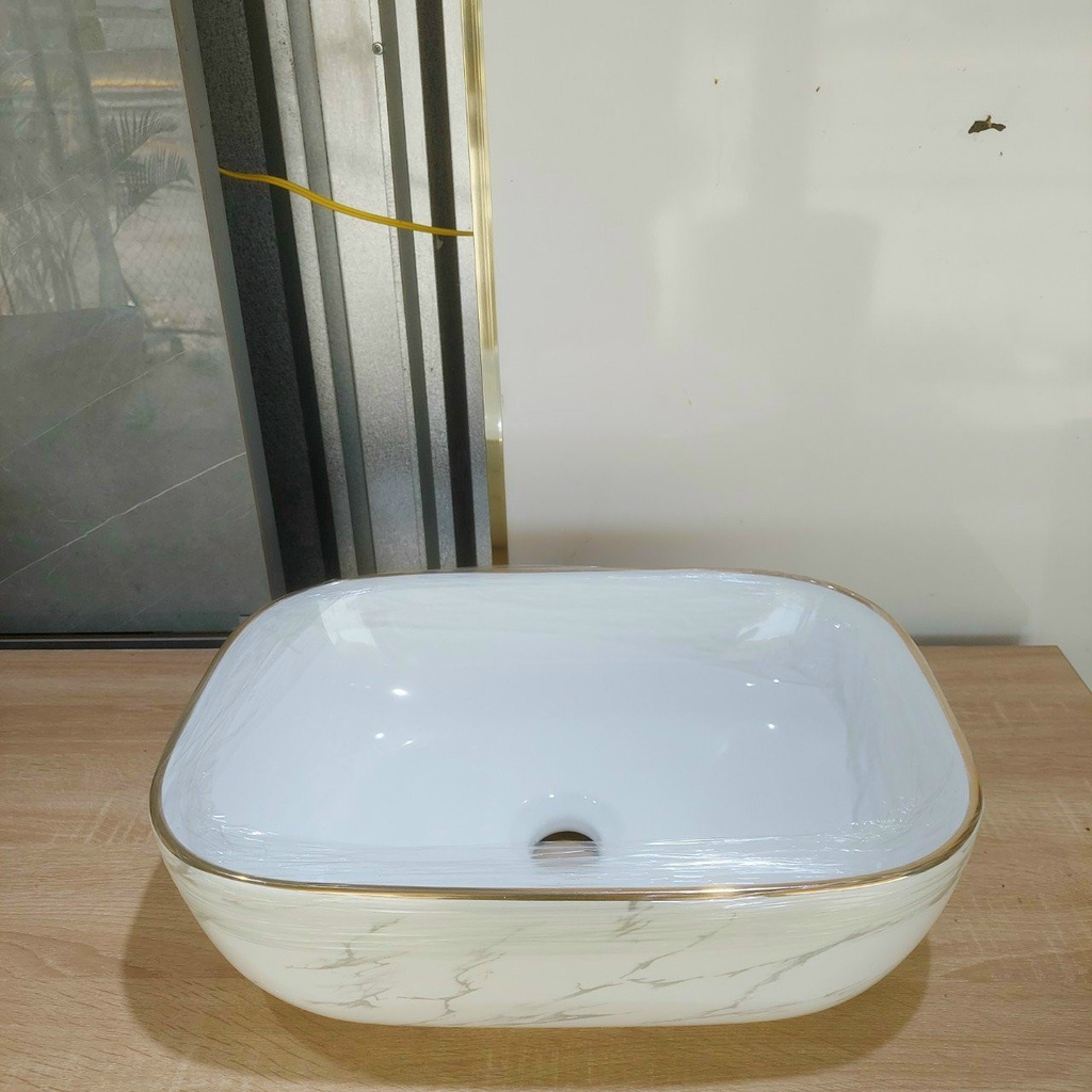 Lavabo rửa mặt đặt bàn vân mây viền vàng
