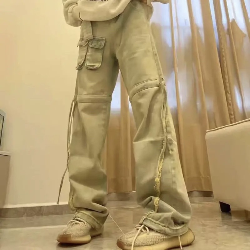Quần jeans HỘP DÂY NGANG ĐÙI PHỐI TUA RUA