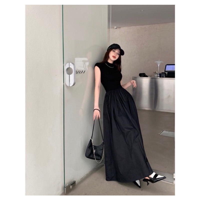 Đầm đen tay hến