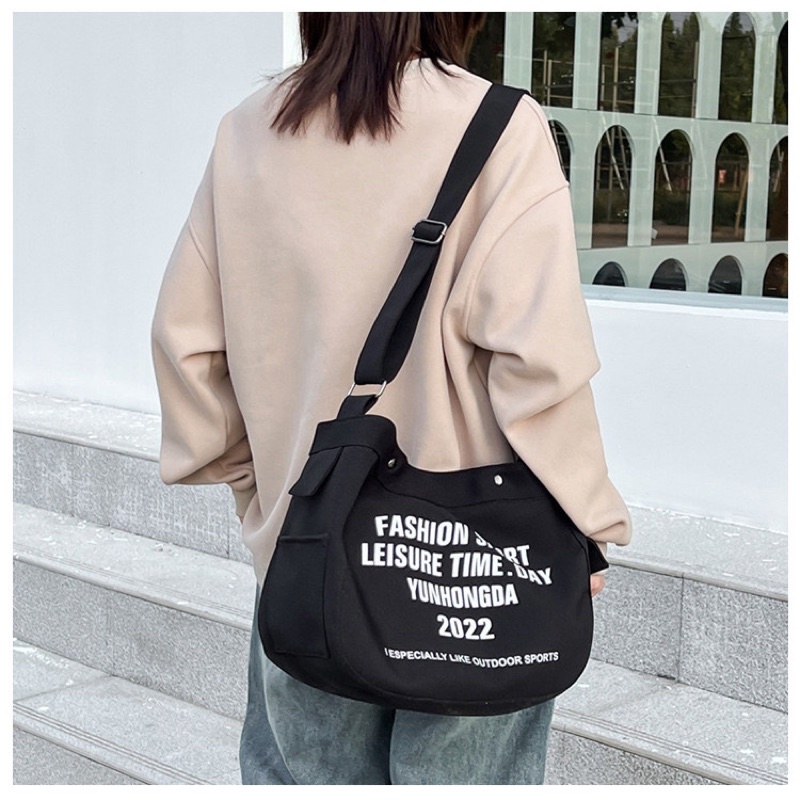 túi đeo chéo unisex,chất kaki in chữ Hongda 3 màu