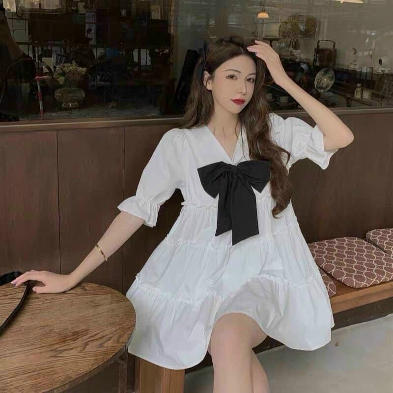 Đầm babydoll nữ váy tiểu thư trắng xoè cổ v đính nơ chất thô mềm xếp tầng phông cách hàn quốc