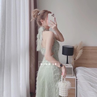 Đầm maxi xanh lông vũ cổ yếm cột nơ hở lưng