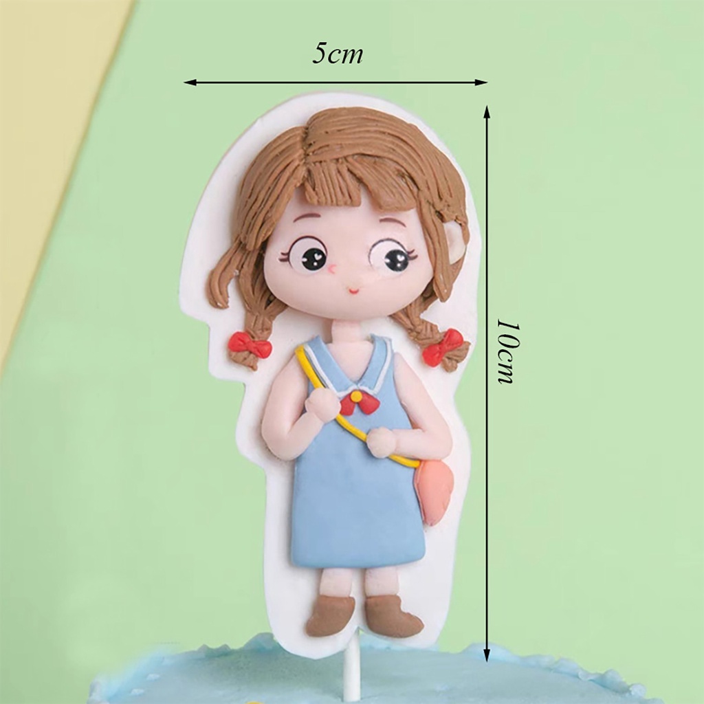 tượng silicon bé gái đeo túi