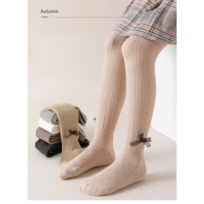 Quần tất len đính nơ cho bé gái mềm và ấm, trơn màu, co giãn 4 chiều size từ 1 đến 12 tuổi