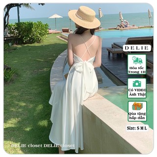 Váy maxi hở lưng trắng DELIE đầm hai dây lụa satin cao cấp đi biển, đi du lịch,đi tiệc có thắt nơ sau lưng cuốn hút VK09