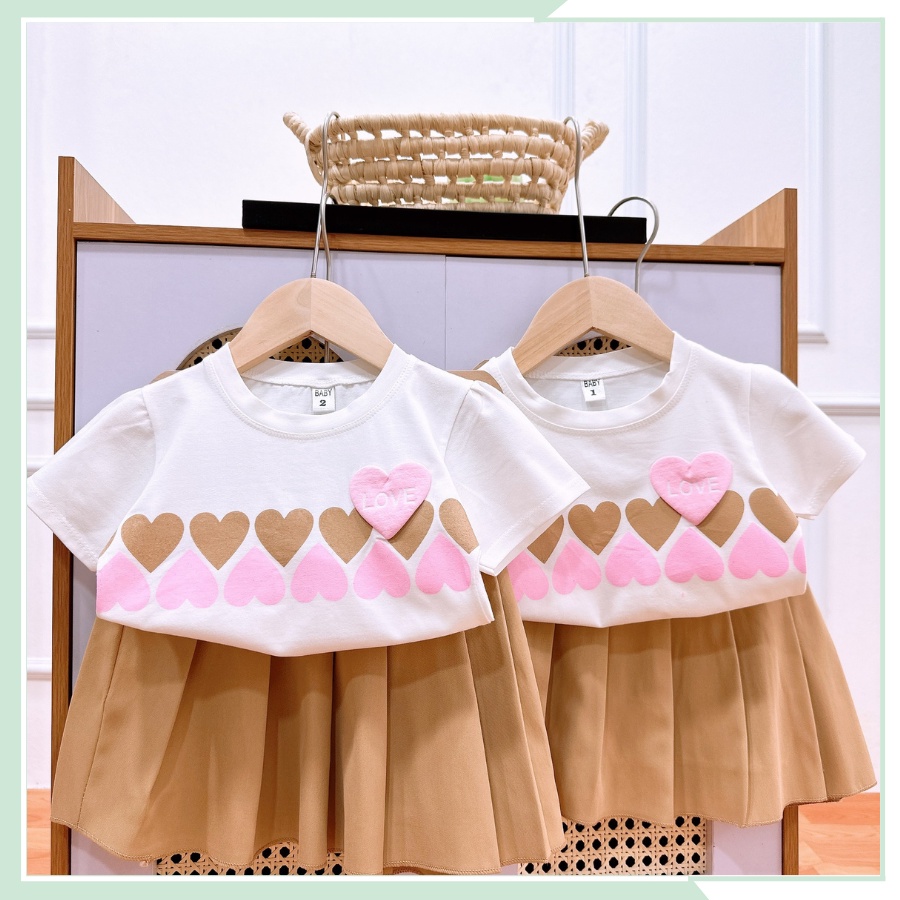 Bộ đồ bé gái, Áo thun in họa tiết trái tim kèm chân váy xép li siêu điệu cho bé đi học đi chơi BBG42