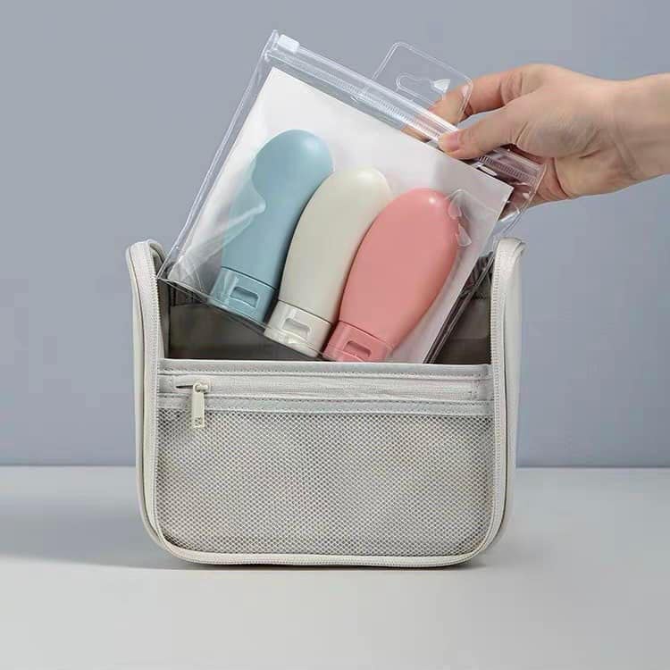 Lọ chiết mỹ phẩm, dầu gội, sữa tắm mang đi du lịch siêu tiện lợi kèm túi zip dung tích 60ml