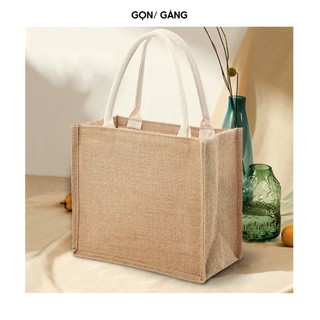Túi cói B5 túi đựng quần áo trơn đi biển đi làm bỉm sữa đứng form chống nước quai xách đeo vai đựng đồ Gọn Gàng