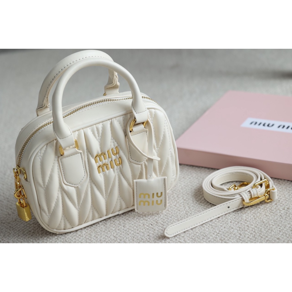 Túi cầm tay đeo chéo MIUMIU TRỐNG SZ21