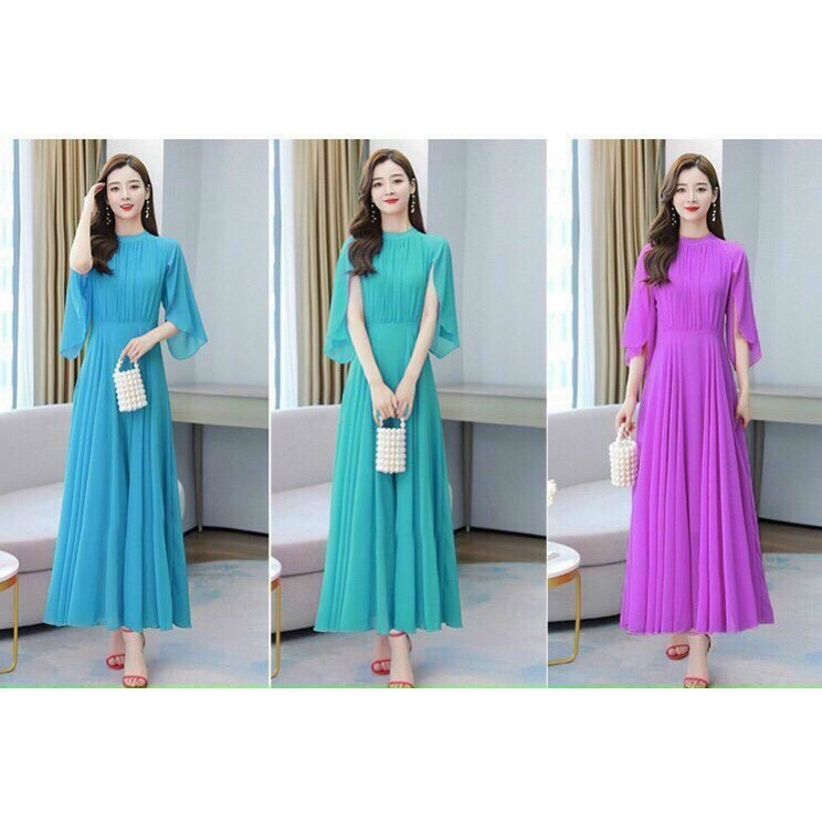 ĐẦM MAXI XẾP LI TAY CÁNH TIÊN Chất: chiffon Màu: tím, xanh ngọc, xanh dương Kiểu dáng: đầm dáng xòe dài, cổ trụ, tay cán