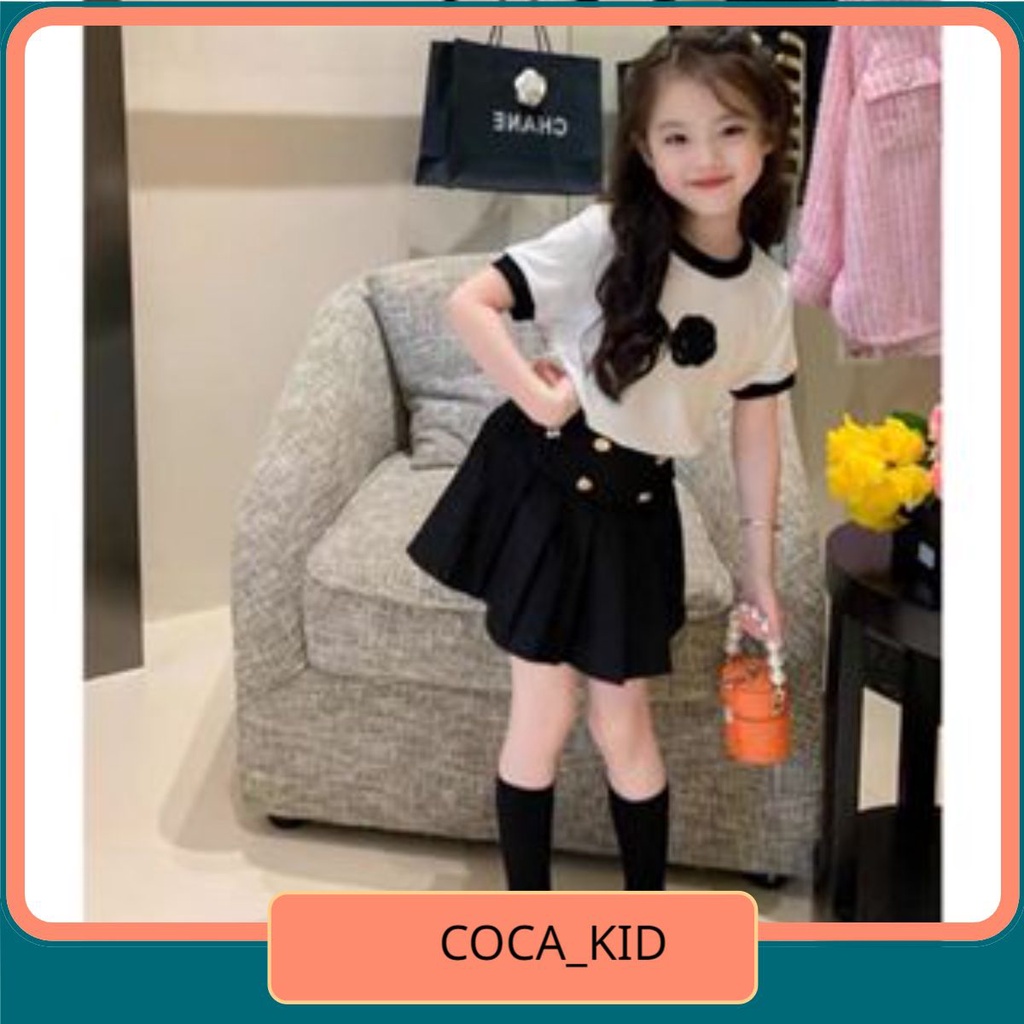Set váy "Hoa trà" cho bé gái 4-14 tuổi 18-48kg.Thiết kế áo thun trắng phối chân váy đen xếp ly điệu đà.BG31