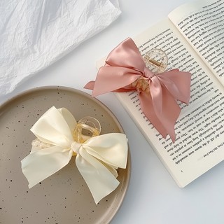 Kẹp tóc hình nơ vải satin màu trơn xinh xắn cho nữ hai màu hồng, trắng