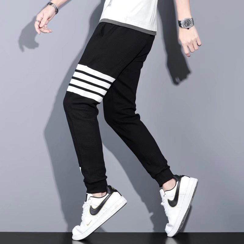 Quần jogger thể thao nam unisex chất xốp kẻ viền ngang bo gấu phong cách trẻ trung cá tính - Fashion Hand