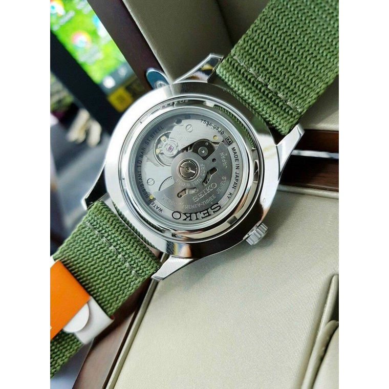 Đồng hồ cơ nam Seiko 5 SNZG09K1 mặt kính Hardlex Crystal chống xước, chống nước 10 ATM, dây dù đeo tay cao cấp
