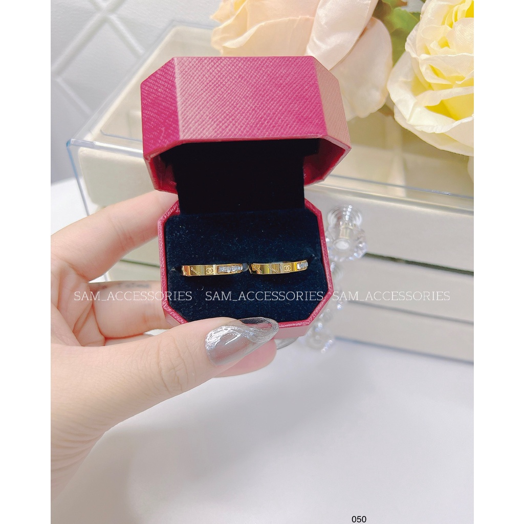 Nhẫn titan hiệu X nửa đá nửa chữ