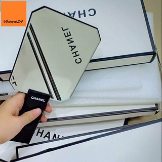 Gương cầm tay trang điểm