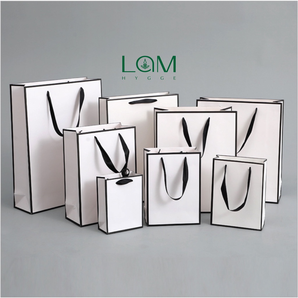 Túi giấy bìa cứng trắng viền đen, quai xách vải đen