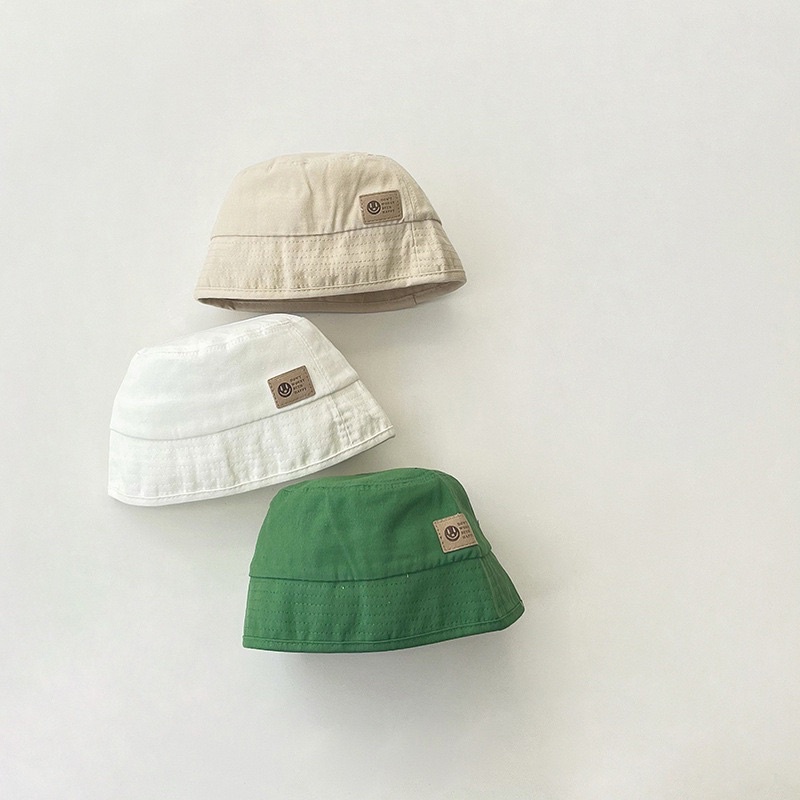 Mũ bucket vành cụp cho bé, gắn tag da ngầu