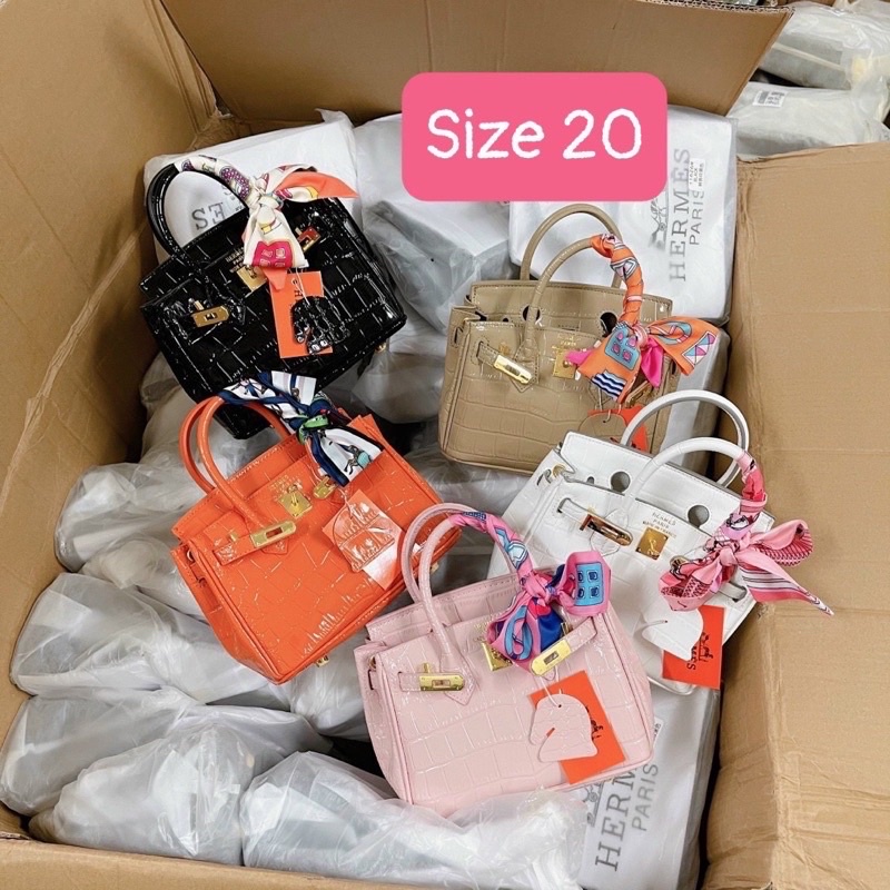 Túi H.M da bóng vân rắn