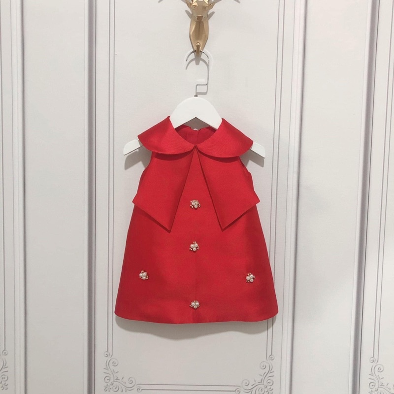 Đầm bé kết hạt trai