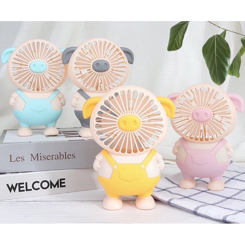Quạt mini cầm tay tích điện hình con heo cute